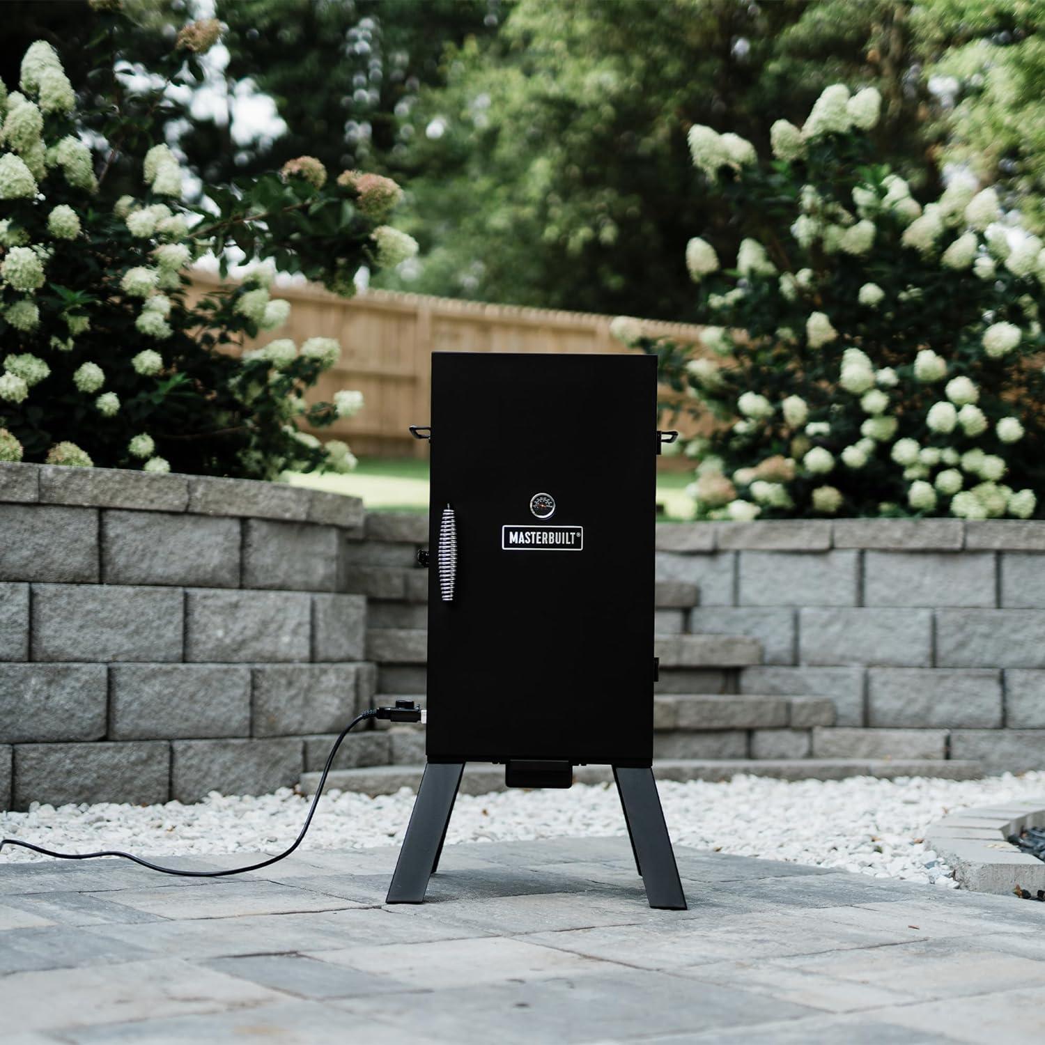 imageMasterbuilt 40inch Digital Electric Vertical BBQ Smoker with Side Wood Chip Loader Chrome Smoking Racks and 970 Cooking Square Inches in Black Model MB2007291830inch Analog