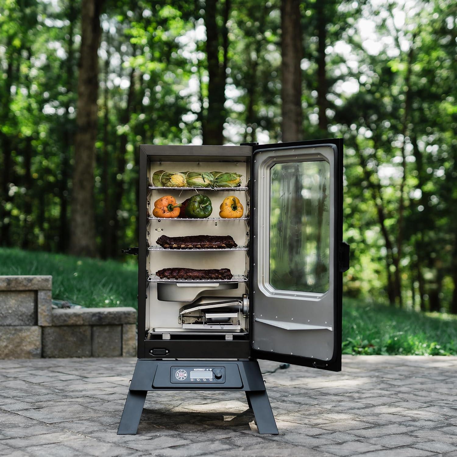 imageMasterbuilt 40inch Digital Electric Vertical BBQ Smoker with Side Wood Chip Loader Chrome Smoking Racks and 970 Cooking Square Inches in Black Model MB2007291830inch Digital with Window Legs Wifi
