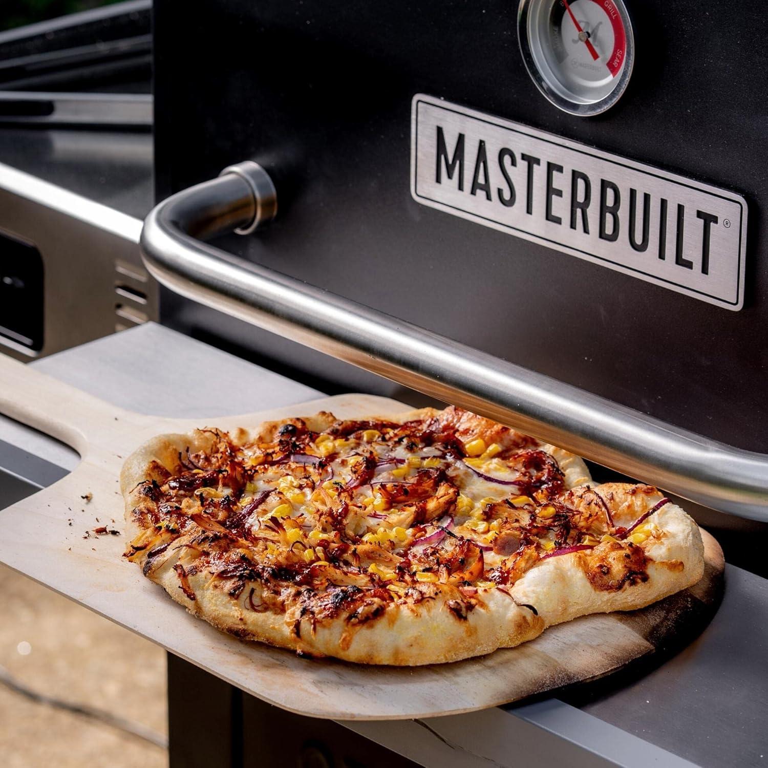 imageMasterbuilt Gravity Series Outdoor Pizza Oven Accessory insert with Ceramic Pizza Stone PorcelainCoated Exterior with Stainless Steel Interior in Black Model MB20181722