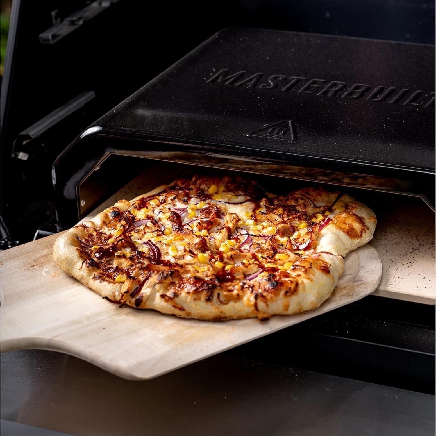 imageMasterbuilt Gravity Series Outdoor Pizza Oven Accessory insert with Ceramic Pizza Stone PorcelainCoated Exterior with Stainless Steel Interior in Black Model MB20181722